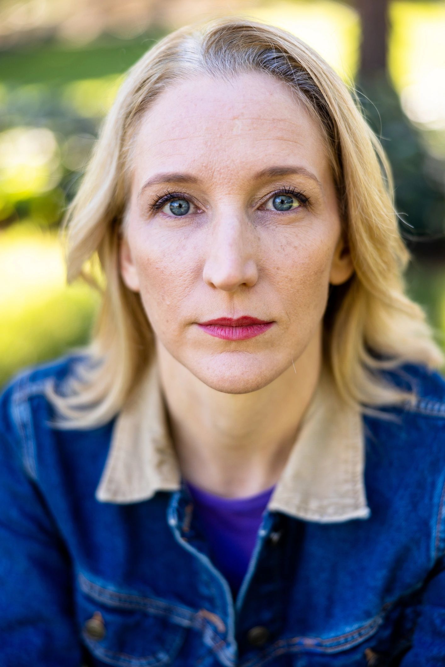 Portrait-style image representing author Robyn Busfield in a natural setting