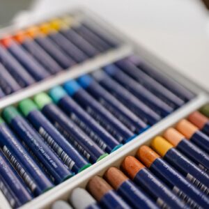 Top View of Oil Pastels on White Background