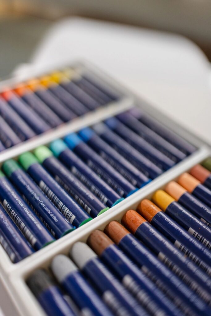Top View of Oil Pastels on White Background